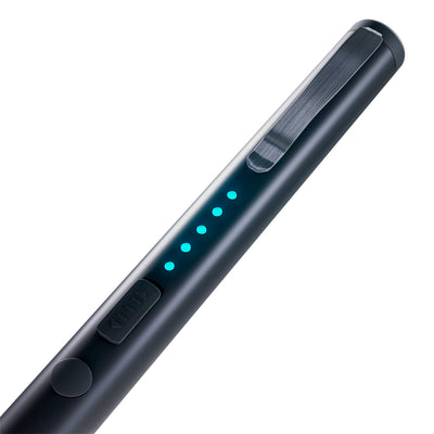 Close-up of pen stun gun showing LED battery indicator lights and safety switch
