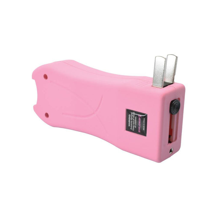 Streetwise pink stun gun with built-in charger and safety switch