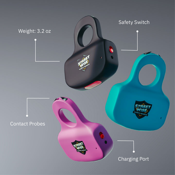 Three Streetwise Sting Ring stun guns in black, pink, and teal showing safety switch, charging port, and contact probes