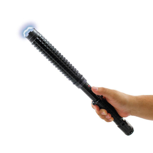 Hand holding Streetwise expandable stun baton with electric arc activated for protection